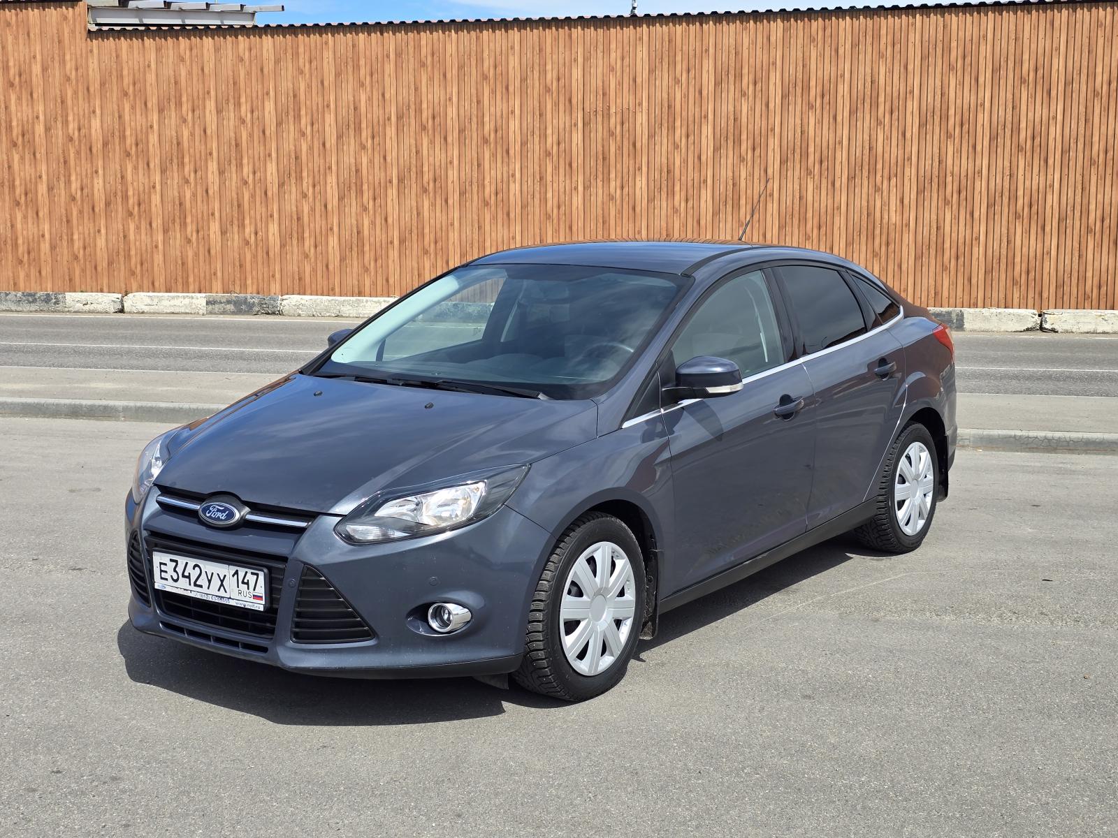 Ford Focus 2014 с пробегом — фото автомобиля ЮНХЭ