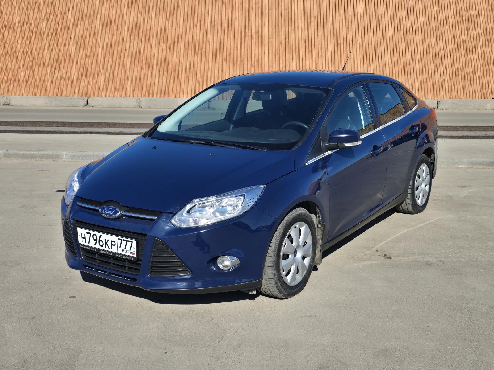 Ford Focus 2014 с пробегом — фото автомобиля ЮНХЭ